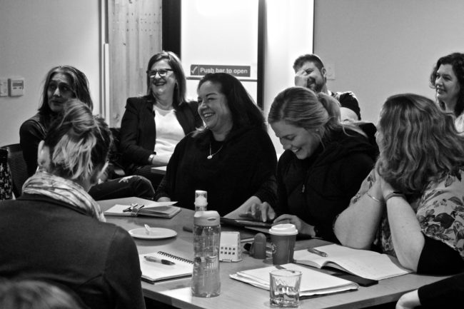 Image of a group of learners around a table